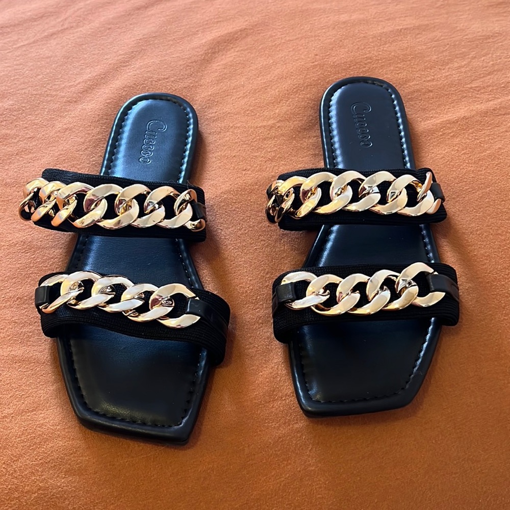 Women’s black and gold sandals. Size 7. Hardly worn.